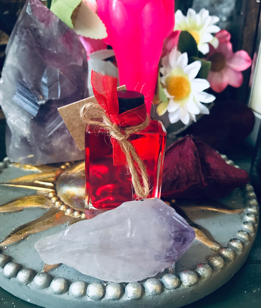 Root Chakra Sweet Muse Oil And Candle Set.